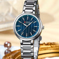 Reloj CURREN Blanche para Mujer – Elegancia Plateada con Esfera Azul Texturizada