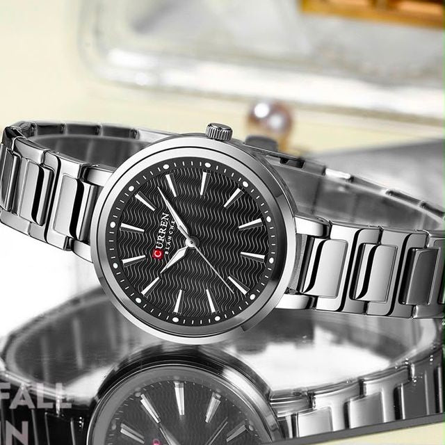 Reloj CURREN Blanche para Mujer – Elegancia Plateada con Esfera Negra Texturizada