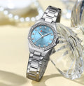 Reloj CURREN Blanche para Mujer – Acero Inoxidable Plateado con Esfera Azul y Cristales Elegantes