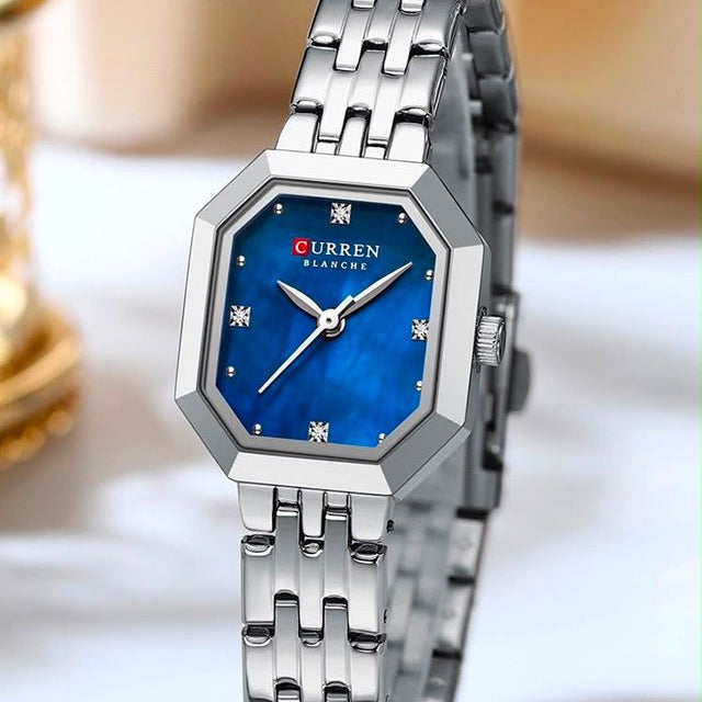 Reloj CURREN Blanche para Mujer – Elegancia Plateada con Esfera Azul y Diseño Octagonal