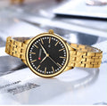 Reloj CURREN para Mujer – Elegancia Dorada con Esfera Negra y Cristales
