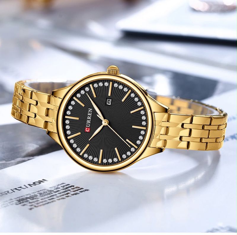 Reloj CURREN para Mujer – Elegancia Dorada con Esfera Negra y Cristales