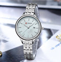 Reloj CURREN para Mujer – Elegancia Plateada con Esfera Blanco Perla y Cristales